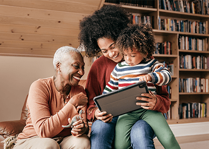 Grandmother, mother and son hanging out